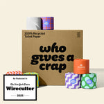 A large box of Who Gives A Crap 100% Recycled Toilet Paper with colorful wrappers - eco-friendly, biodegradable and sustainable toilet paper. Displays a badge stating "As Featured In The New York Times Wirecutter 2025"